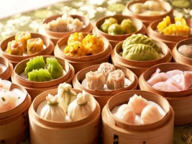 T-Pot&BBQ-Asian-Fusion-Restaurant-Assorted-Dim-Sum-College-Park A variety of colorful and delicious dim sum, including dumplings and buns, presented in bamboo steamers. 发消息、输入 @ 选择技能或 / 选择文件 Wing Side-Cleveland 餐厅宣传 Domain Name Operation Confirmat