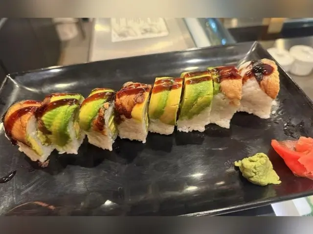 T-Pot&BBQ-Asian-Fusion-Restaurant-Avocado-Unagi-Roll-College-Park Tasty sushi roll with avocado, unagi (eel) and rice, drizzled with sauce, served with wasabi and
