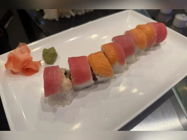 T-Pot&BBQ-Asian-Fusion-Restaurant-Tuna-Salmon-Roll-College-Park Appetizing sushi roll with tuna, salmon and rice, served with wasabi and pickled ginger.